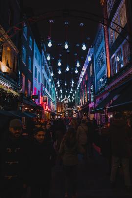 An evening in SoHo, London, during the Christmas season.