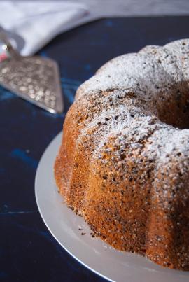 Bundt cake dessert on a marble surface, baking on a cozy Christmas evening.