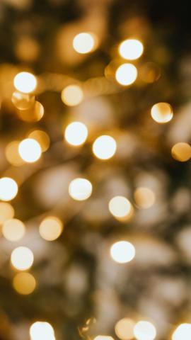 Download free image of Blurry warm Christmas bokeh light mobile wallpaper by Karolina  Kaboompics about christmas tree christmas bokeh christmas lights and iphone wallpaper 2253769