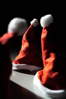 Christmas dump: close-up of santa clause hats