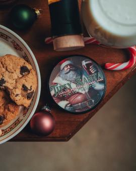 Christmas themed Product photo of Tipsy Santa Beard Balm by Daily Grind Beard Co. Product Photography by Lance Reis.