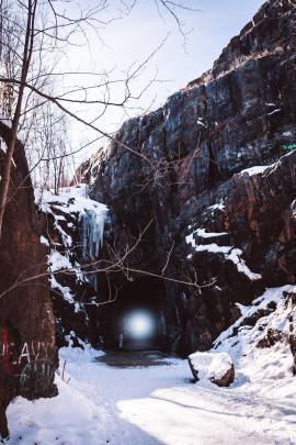 An old tunnel in duluth, minnesota with an orb of light and a moody scene