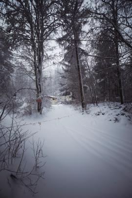 Lost place – abandoned inn in winter landscape
