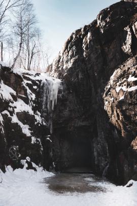 An old tunnel in a cliff in Duluth, Minnesota in winter