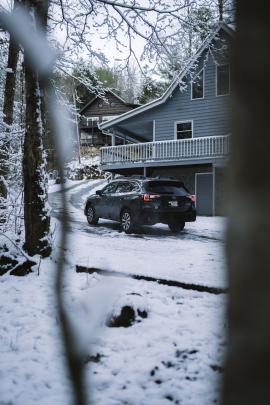 Subaru Outback on a snowy trail