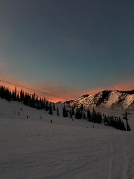 going snowboarding in the mountains in washington, came across a beautiful sunset as a lovely background for the mountain range.