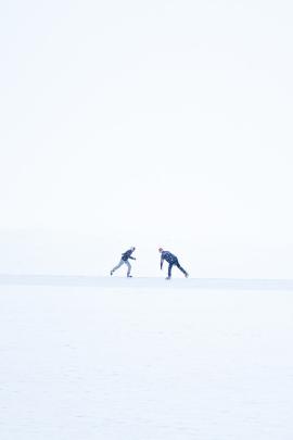 Two men figure skating on a frozen lake. - - - Hey, if you like my photos and want to see more, visit my webpage myrtorp.com - Paypal Support: paypal.me/pmyrtorp - follow me on Instagram: @myrstump - Contact me at Philip@myrtorp.net