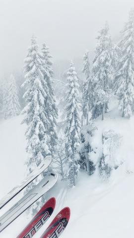 Sitting in ski lift over winter landscape
